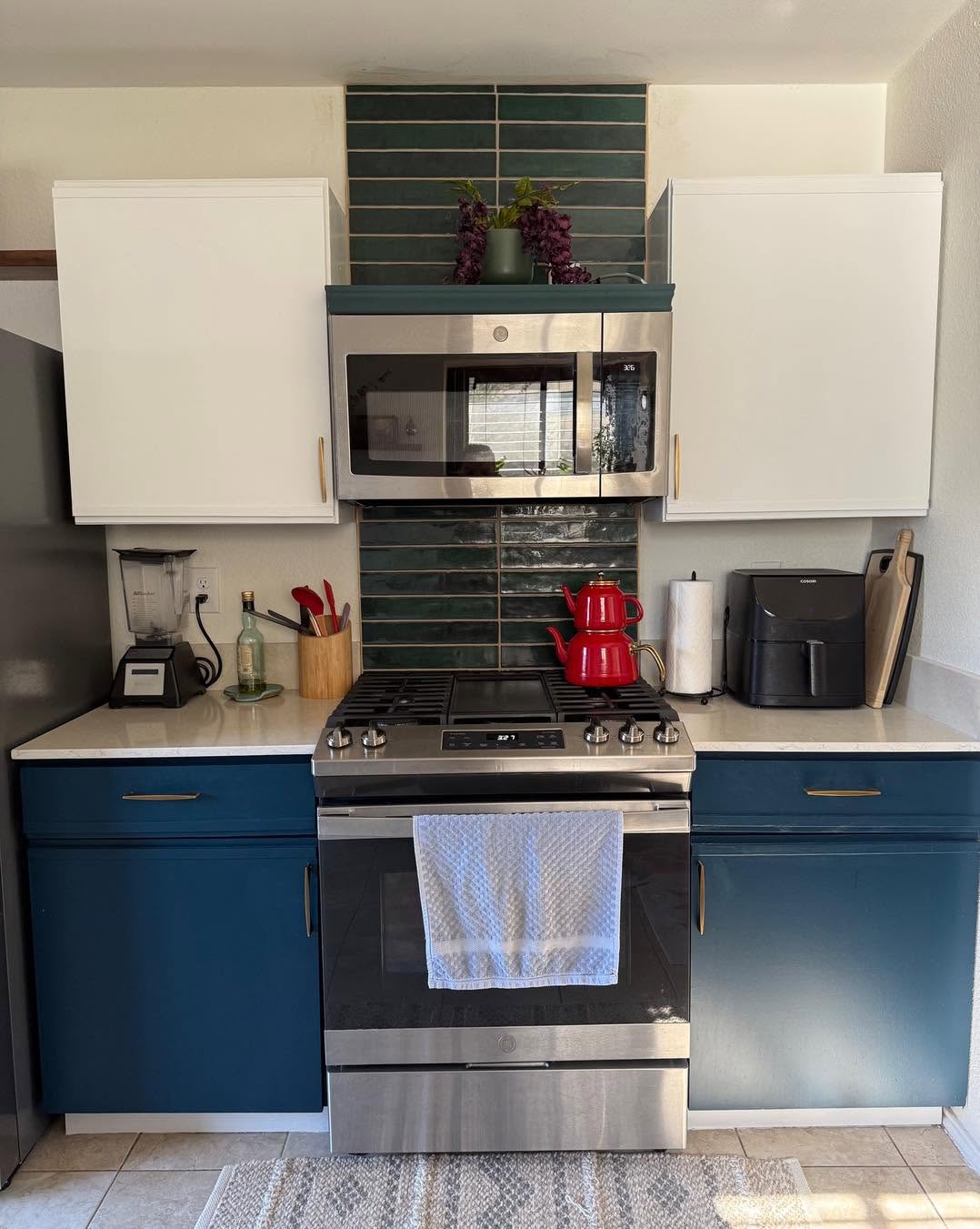 Completed kitchen remodel with updated cabinets and finishes