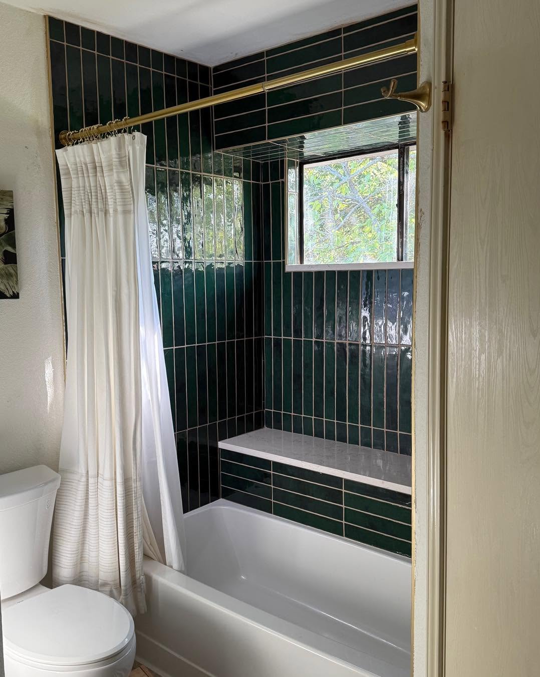 Updated bathroom with fresh paint and fixtures